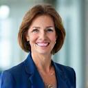 Smiling female CEO looking confidently forward